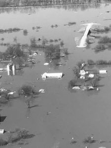 Fast moving water approaching Thurman, Iowa, evacuation operations underway
