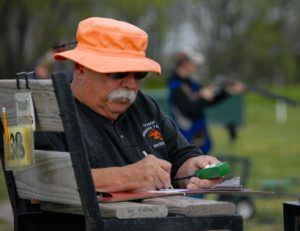 Working with kids keeps drawing Les Hlavac back to the Cornhusker Trapshoot
