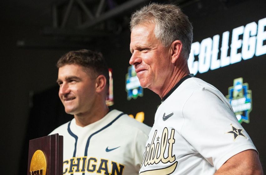 Vanderbilt head coach Tim Corbin stands next to Michigan Erik Bakich, his once former assistant, during a press conference for the CWSchampionship series. Z LONG/THE WORLD-HERALD