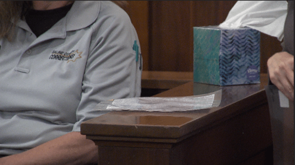 Saline County corrections supervisor Christina Stahl is handed letters that Aubrey Trail allegedly wrote to Bailey Boswell while they were housed in the Saline County jail.