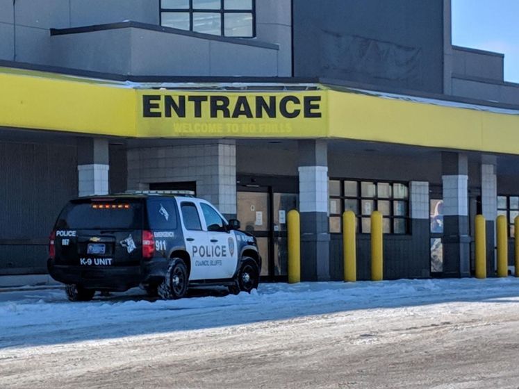 Council Bluffs police investigate the discovery of a body at a former No Frills Supermarket at 1817 West Broadway in January. Workers removing the store’s shelving and coolers found the body. WORLD-HERALD NEWS SERVICE