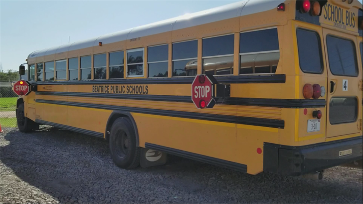 School Bus with Stop Arm Extended, Lights Flashing