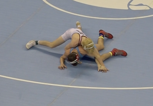 Beatrice's Drew Arnold goes for the pin in his 3rd place medal match.