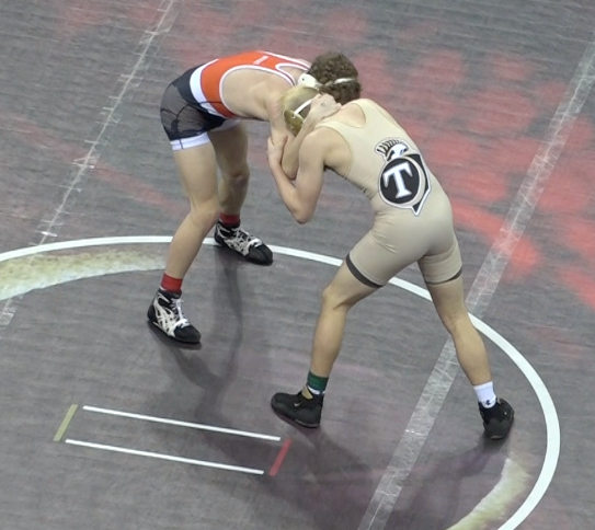 Thayer Central's Jackson Fuelner locked in with Derek Gibson of Maxwell.