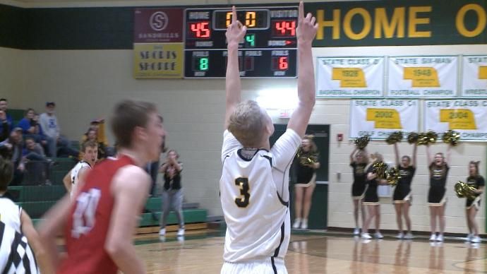 Clayton Moore points to the sky after his team defeated Medicine Valley on Tuesday night.