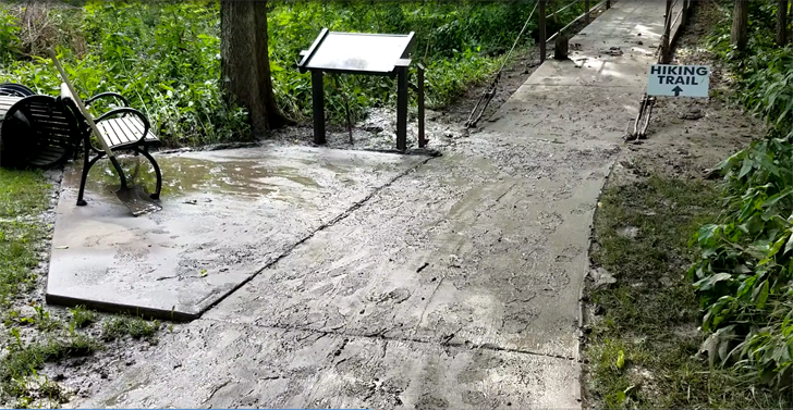 Mud Covers path to suspended walkway