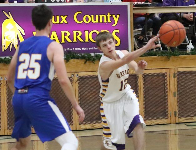 William Skavdahl makes a pass around a Morrill defender Monday.