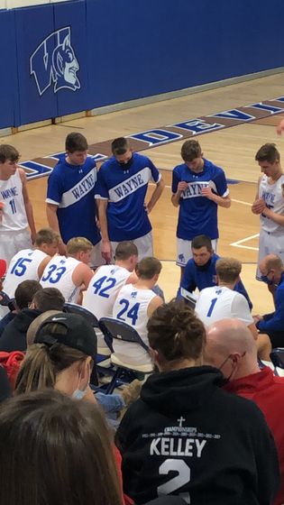 Coach Rob Sweetland coaches up Wayne in their 55-43 win over Norfolk Catholic