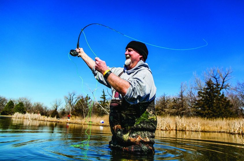 Dennis Ahl of Fairbury fly fishes the trout lake at Two Rivers State Recreation Area in Douglas County on a March day in 2017.