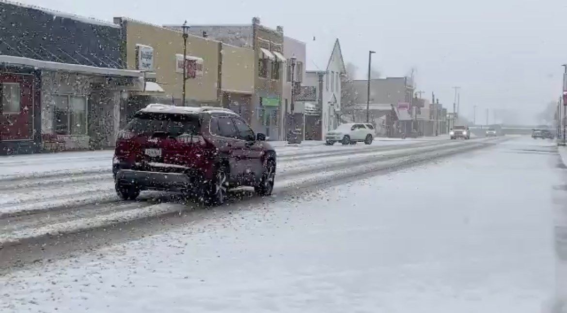 Snow falls in downtown Kimball on Saturday afternoon, March 13, 2021.