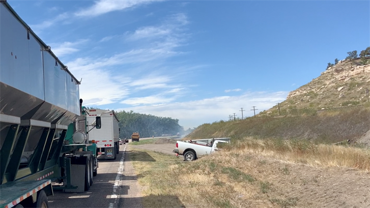 Traffic backs up on Highway 30 near the Point of Rocks east of Potter after a crash early Monday afternoon. Photo by Elic Chisam. (Note: The white pickup in the foreground is part of a construction crew working nearby and was not involved in the crash).