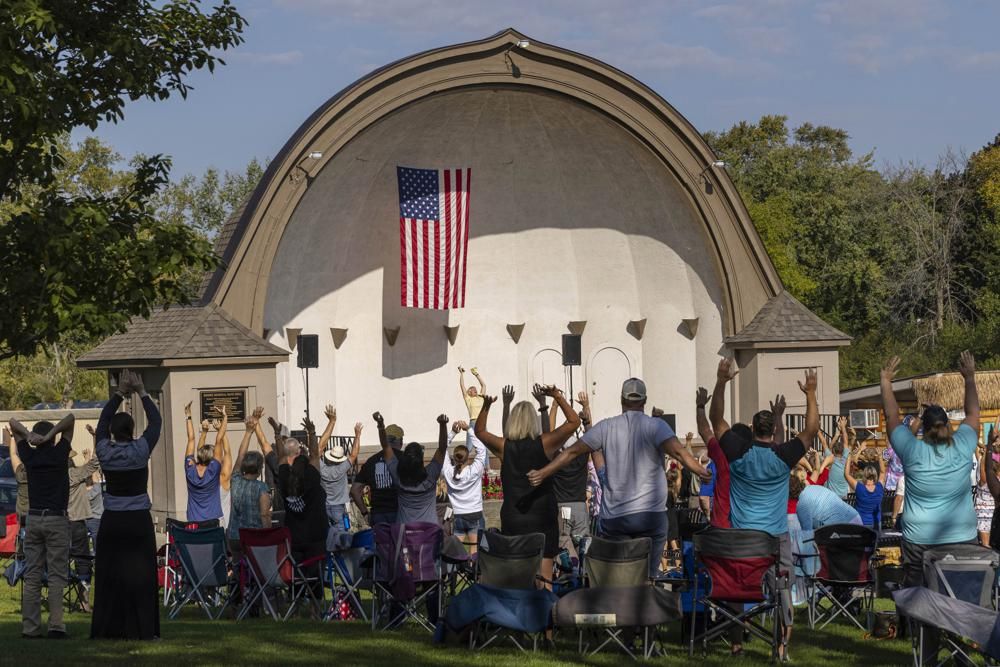 People listen to speakers at the Chiropractic Society Health Freedom revival Sunday, Sept. 19, 2021 in Oconomowoc, Wis.